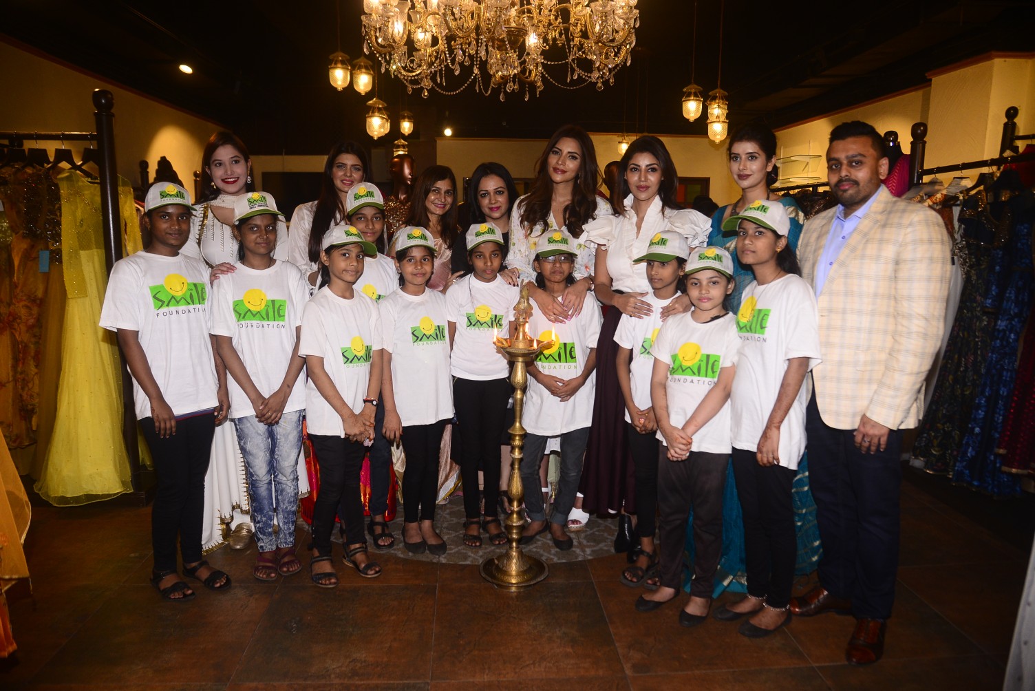 Image 1 – R-L Ketan Chokshi, Charu Asopa, Debina Bonnerjee, Shama SIkander, Jhelum Gopal Dalvi, Jyotika Gundecha, Ihana Dhillon at Smile Foundation Charity Trunk show Indulge4smile in